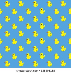 Yellow rubber duck pattern on blue background