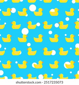 Yellow rubber duck seamless pattern. Bath time toys, ducks and soap bubbles. Fabric, wrapping wallpaper print design. Vibrant vector background