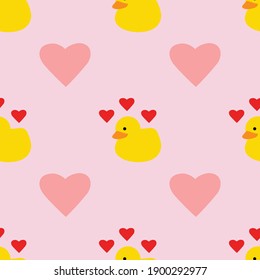 Yellow rubber duck Valentines Day with pink hearts seamless repeating background pattern