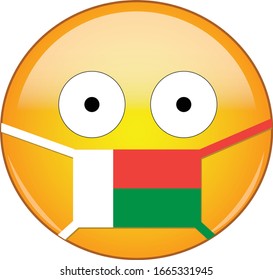Yellow scared emoji in Malagasy medical mask protecting from SARS, coronavirus, bird flu and other viruses, germs and bacteria and contagious disease as well as toxic smog in Madagascar.