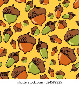 Yellow seamless pattern with autumn acorns. Vector pattern with green and brown acorns. Can be used for wallpaper, pattern fills, web page background, surface textures.