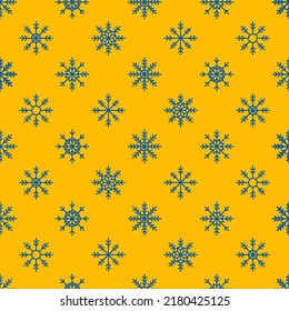 Yellow seamless pattern with blue snowflakes.
