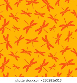 Yellow seamless pattern with orange dragonflies