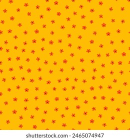 Yellow seamless pattern with orange small tiny flowers