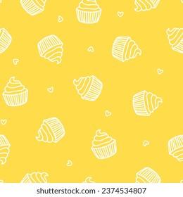 Yellow seamless pattern with white cupcakes and hearts