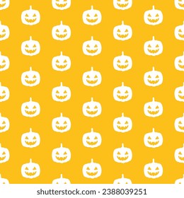 Yellow seamless pattern with white halloween skull