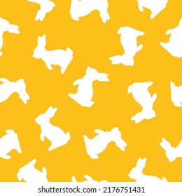 Yellow seamless pattern with white rabbit.