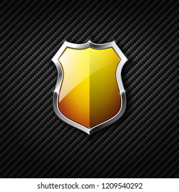 Yellow shield on carbon background. Vector illustration
