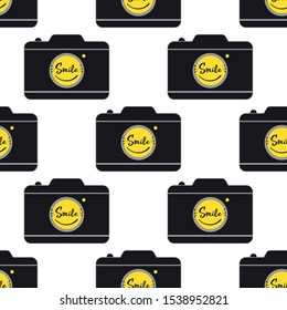 Yellow smile face in black camera - vector seamless pattern on a white background. A pattern with a smile in the camera.