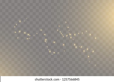 Yellow sparks glitter special light effect. Vector sparkles on transparent background. Christmas abstract pattern. Sparkling magic dust particles