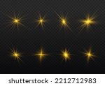 Yellow sparks with light effect. Magical explosion gold star. Sun flash sparkle. Set of bright beautiful stars. Golden glitter and glare. Flare of sunshine with rays. Christmas vector illustration.