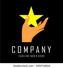 a yellow star on a hand