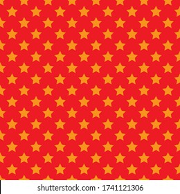 Yellow stars on a red background.  wrapping paper.