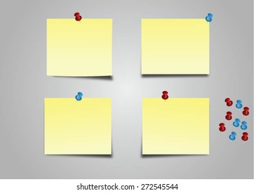 Yellow stick note paper  with push pin on grey background