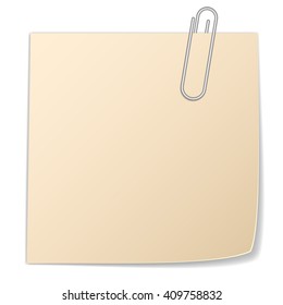 Yellow sticker and paper clip isolated on white background