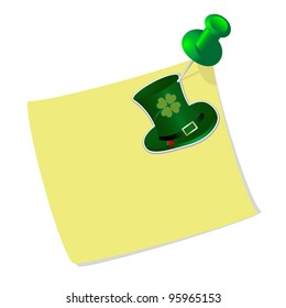 Yellow sticky label with a drawing pin and green hat