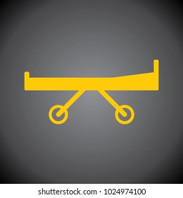 Yellow stretcher icon on black background.