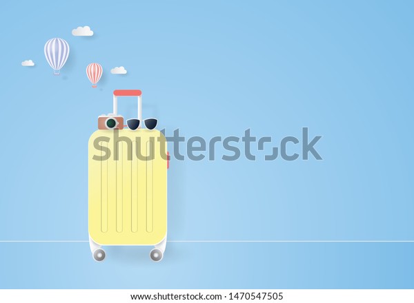 pastel yellow suitcase