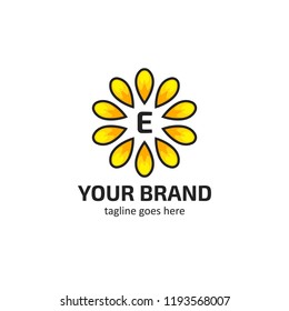 Yellow sunflower petals with letter E logo icon symbol vector