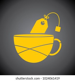 Yellow Tea Cup icon on black background.