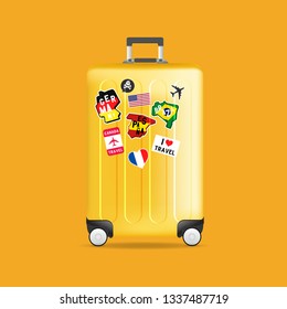 Yellow travel luggage with stickers, labels and Tags. Realistic suitcase.