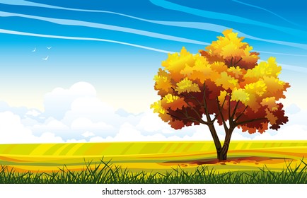 Yellow tree and green grass on a blue sky background with clouds. Vector autumn landscape.