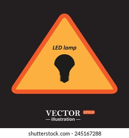 Yellow triangle on a black background, LED lamp , vector illustration, EPS 10