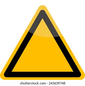 Yellow triangular shaped traffic sign with fence