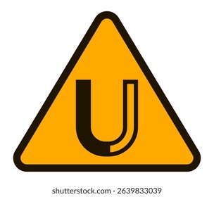 Yellow triangular warning sign featuring a black horseshoe magnet, highlighting magnetic fields and cautioning against magnetism related hazards in industrial settings