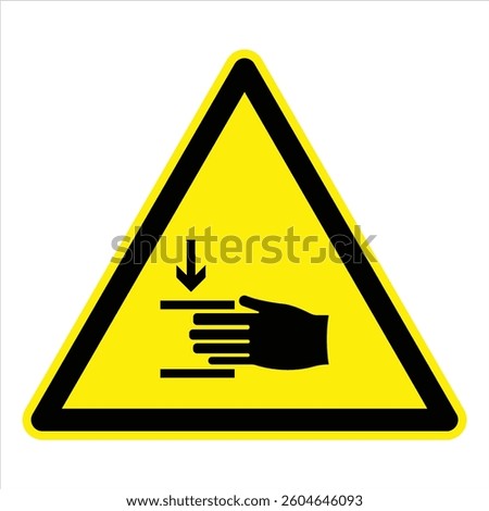 Yellow triangular warning sign indicating a hand crushing hazard, promoting workplace safety and preventing accidents.