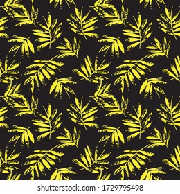 Yellow Tropical Leaf botanical seamless pattern background suitable for fashion prints, graphics, backgrounds and crafts