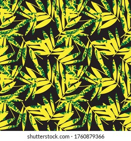 Fondo de patrón inoxidable de la hoja tropical amarilla adecuado para impresiones de moda, gráficos, fondos y artesanías