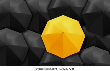 Yellow umbrella standing out from background of black umbrellas. Business and leadership concept.