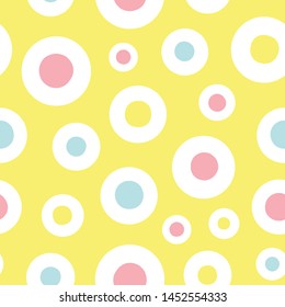yellow vector repeat pattern with blue, yellow and pink polka dots. Pastel colors. Perfect for paper and textile projects. Surface pattern design.