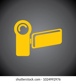 Yellow Video Camera icon on black background.
