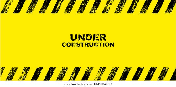 yellow warning sign. Under construction background.