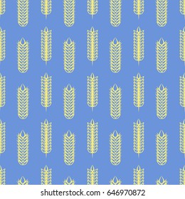 Yellow wheat on blue backrop. Vector agriculture seamless pattern design