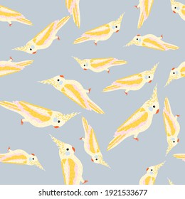 Yellow and white colored cockatoo parrot ornament seamless pattern. Blue background. Random animal print. Flat vector print for textile, fabric, giftwrap, wallpapers. Endless illustration.