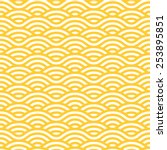 Yellow and white waves seamless pattern. Vector linear ornament.