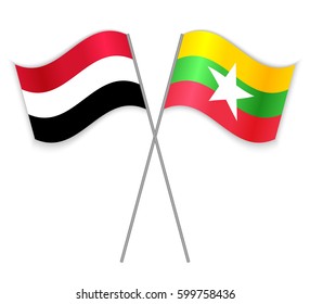 Yemeni and Burmese crossed flags. Yemen combined with Myanmar isolated on white. Language learning, international business or travel concept.