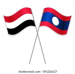 Yemeni and Laotian crossed flags. Yemen combined with Laos isolated on white. Language learning, international business or travel concept.