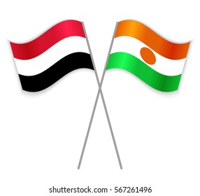 Yemeni and Nigerien crossed flags. Yemen combined with Niger isolated on white. Language learning, international business or travel concept.