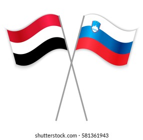 Yemeni and Slovenian crossed flags. Yemen combined with Slovenia isolated on white. Language learning, international business or travel concept.