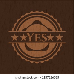 Yes badge with wooden background