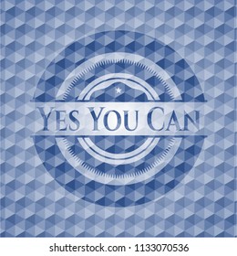 Yes You Can blue badge with geometric background.
