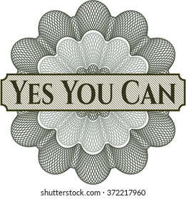 Yes You Can written inside a money style rosette