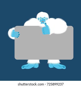 Yeti holding banner blank. Bigfoot and white blank. Abominable snowman joyful emotion. Big white monster and place for text. Vector illustration
