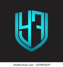 YF Logo monogram with emblem shield design isolated with blue colors on black background
