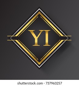 YI Letter logo in a square shape gold and silver colored geometric ornaments.