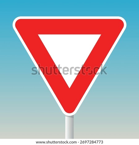 Yield road sign with red inverted triangle and pole for right-of-way and traffic safety